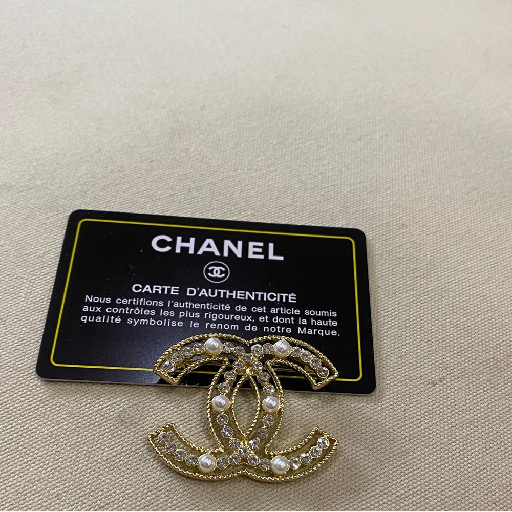 Designer inspired brooch